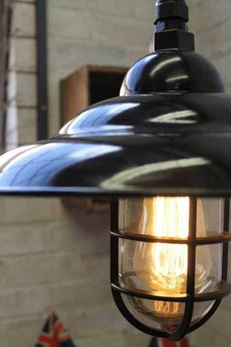 Black enamel shade on industrial bunker pendant light
