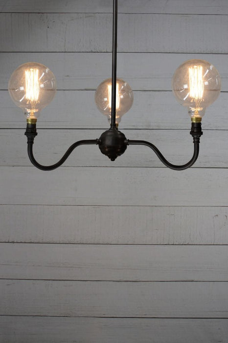Industrial gooseneck chandelier with filament bulbs upright