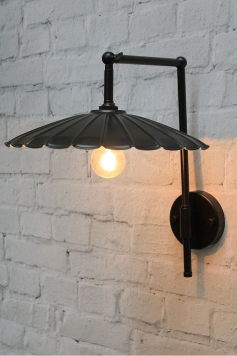 black wall light with umbrella shade