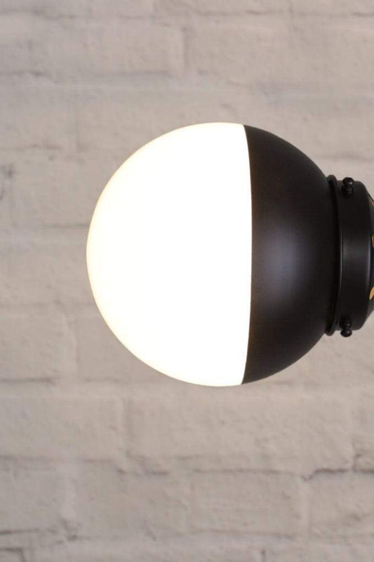 Black opal glass wall light