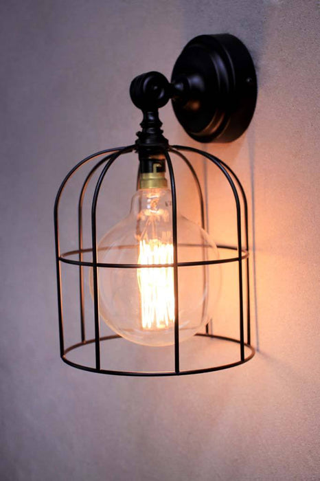 Round cage wall light with large black shade