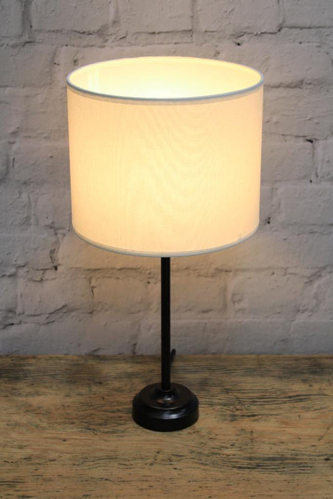 Black table lamp with white fabric shade