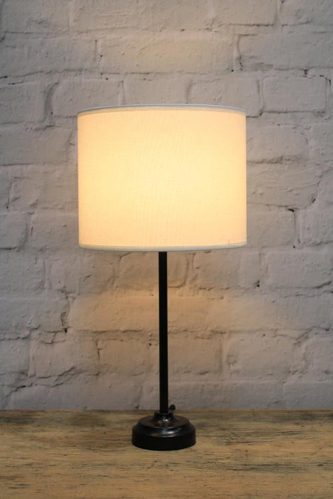Black table lamp with white fabric shade