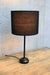 Black table lamp with black fabric shade