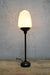 Table lamp with black base and gallery