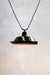 Black factory pendant light with flat frosted cover