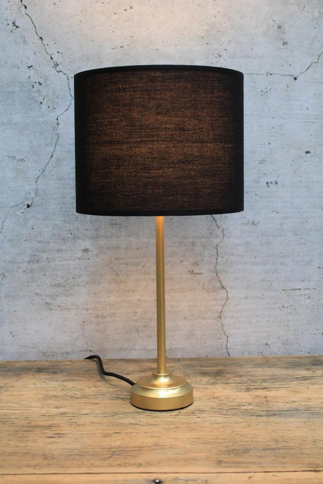 Black fabric shade table lamp with gold base
