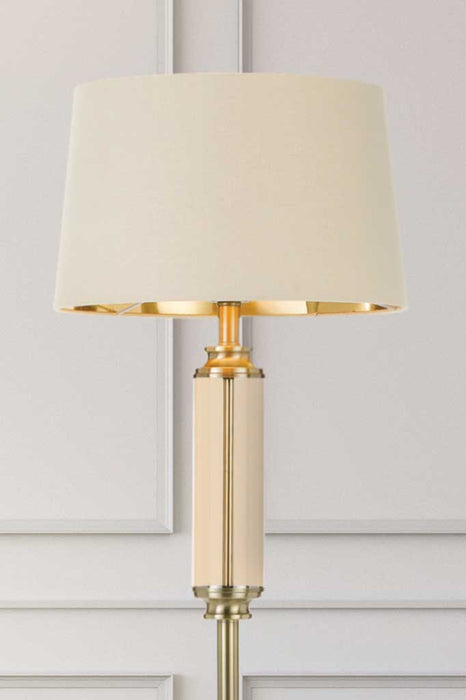 Brass finish glass floor lamp with cream shade