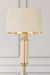 Brass finish glass floor lamp with cream shade