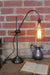 Brass table lamp adjustable curved arm with large filament edison bulb
