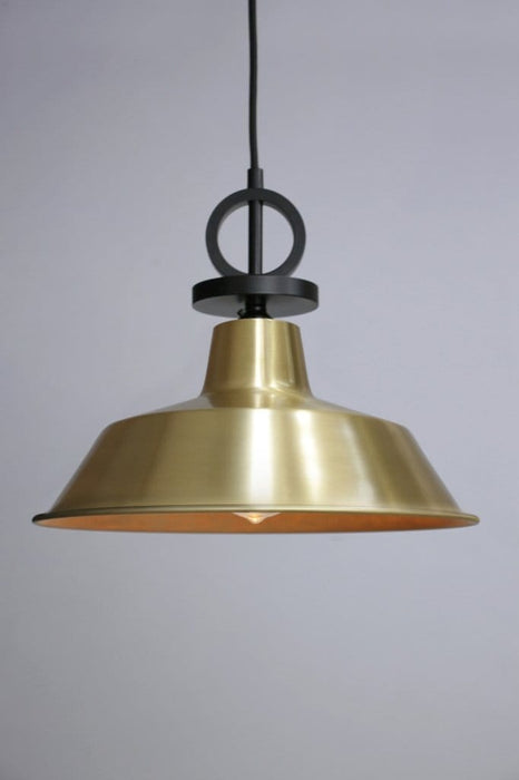 Bright brass factory pendant with black disc cord