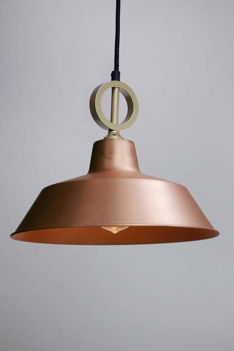 Bright copper pendant light with gold cord and no disc