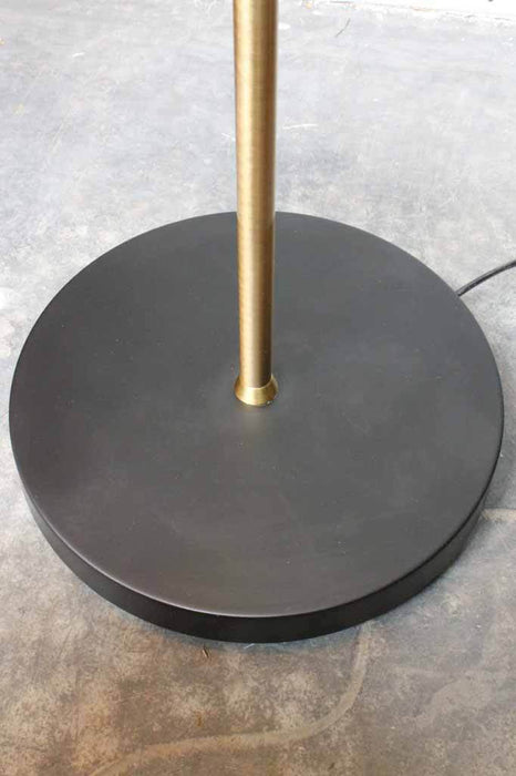 Brushed gold and matt black light. floor lamp for living room. commercial and residential use.