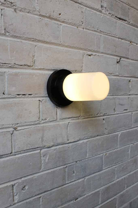 Bunker tube wall light with led teardrop light bulb
