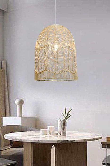 large rattan pendant light over dining table