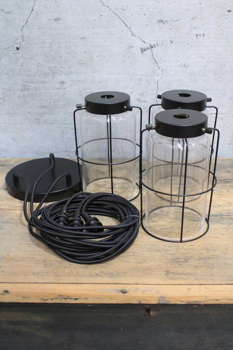 Cage jar pendant lights with glass shades and black ceiling rose
