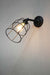 Cage wall light with black finish