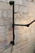 Cage swing arm wall light main arm