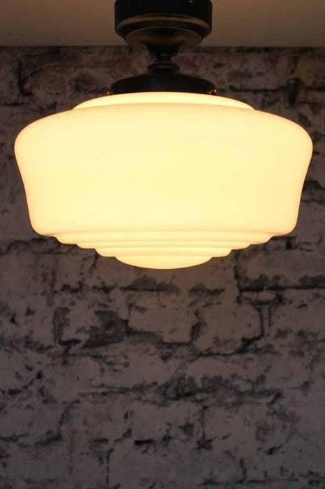 Carlyle hand blown shade with light on perfect for low ceilings in home or bedroom lighting or hallway or kitchen that is traditional or vintage decor