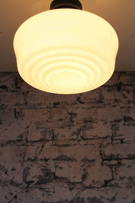Carlyle hand blown shade with light on perfect for low ceilings in the home  cafe or restaurant. Ideal bedroom light or hallway light or kitchen light