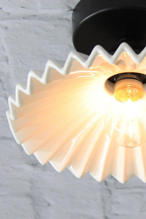 Flush mount ceiling light with glazed white ceramic shade