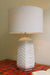 Chevron ceramic table lamp with one lamp holder and inspired from the 1960 s its applied chevron pattered and over pale white glaze
