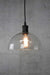 Clear glas pendant light with bulb display
