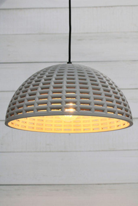 Concrete pendant light with mesh shade