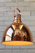 Copper dome pendant light has a copper outter and white inner