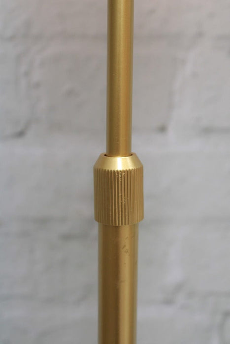 Crown sphere floor lamp pole close up in gold