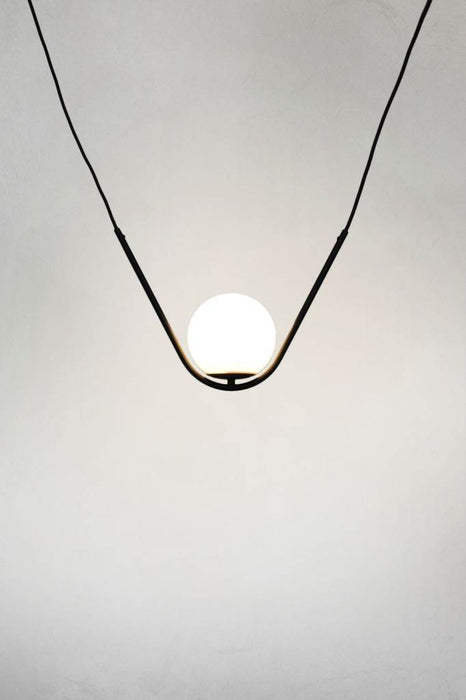 Curved pendant light with opal glass shade