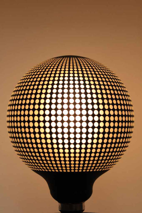 Light bulb with textured dot pattern