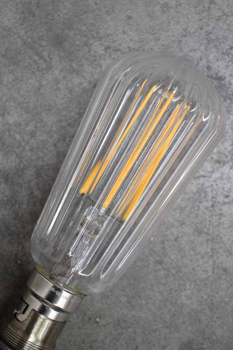 Dimmable LED filament bulbs. Affordable designer light bulbs with decorative pattern