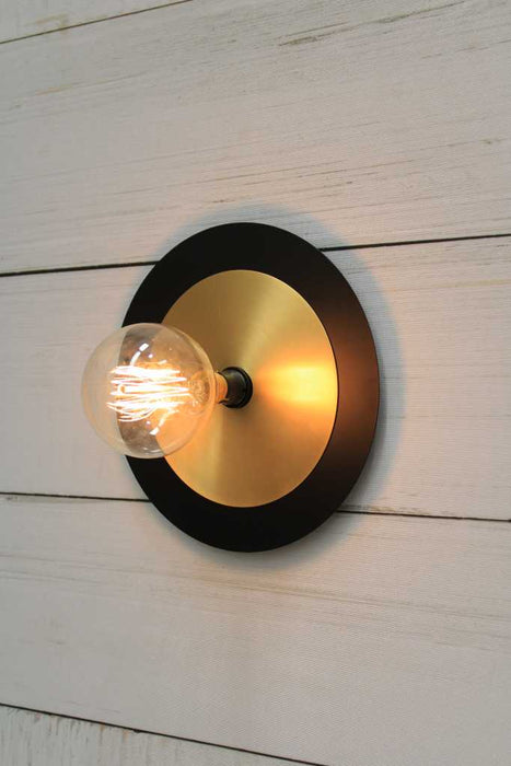 Large black with small brass disc wall light