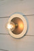 Large white with small metal disc wall light