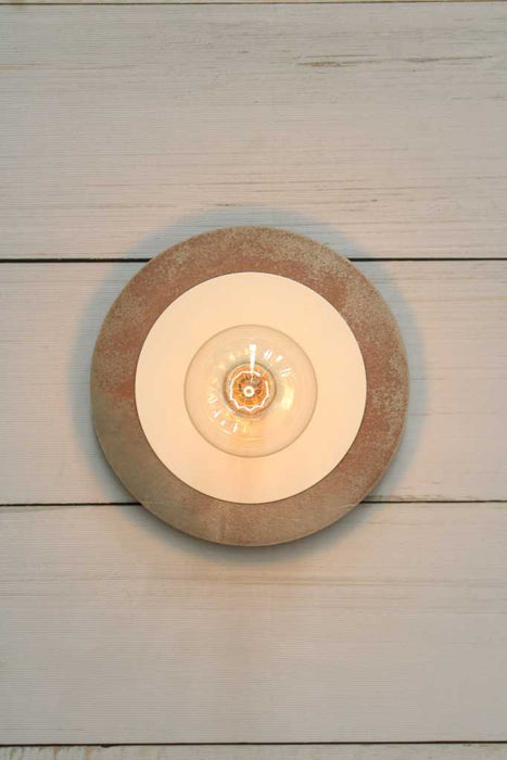 Large metal with small white disc wall light