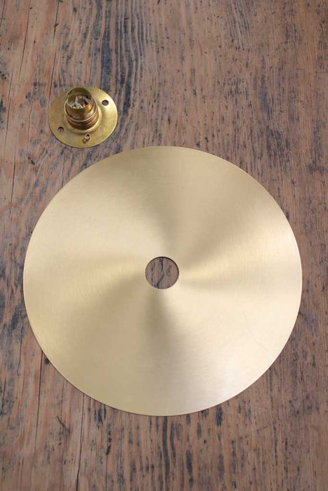Large brass disc wall light disassembled
