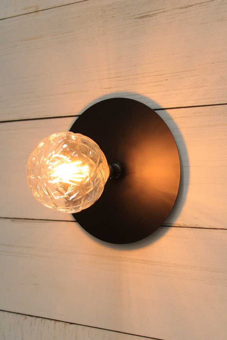 Large black disc wall light