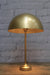 Table lamp with gold/brass dome shade and gold/brass base