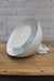 White dome wall light with white disc