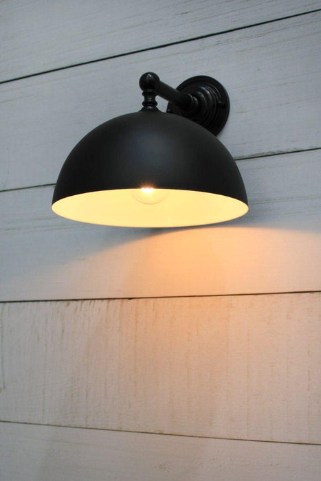 Dome wall light with reflective white inner