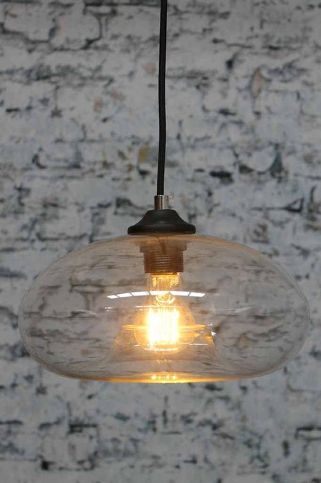 Elliptic Glass Pendant Light. minimalist in design and would make an alluring accent in any modern living room above dining tables