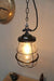 Engine Room Hanging Light. Tear drop glass shade. Black cage. Chain cord. Glass pendant lights for residential or commercial lighting.