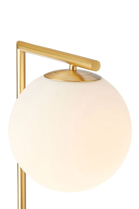 Opal glass ball shade on mid-century modern style floor lamp