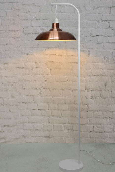 white floor lamp with suspended copper finish shade