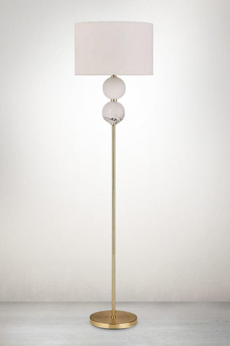 Tribeca Floor Lamp in brass variant. 