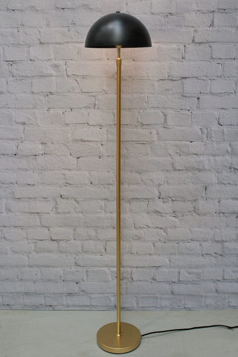 Gold/brass floor lamp with medium black shade
