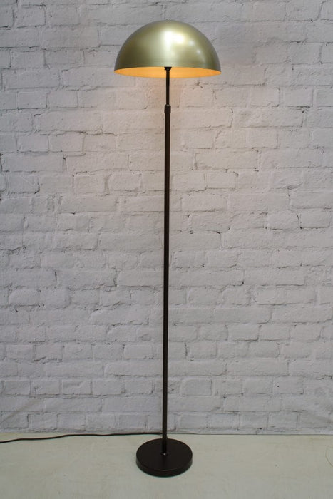 Black floor lamp with large gold/brass shade