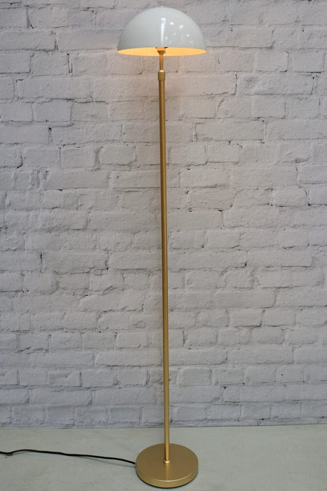 Gold/brass floor lamp with medium white shade