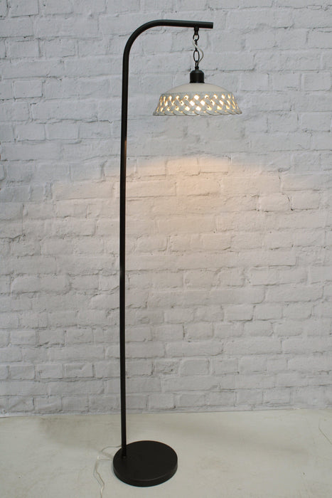 Ceramic floor lamp with black base. 